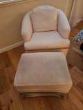 WHITE UPHOLSTERED ARMCHAIR AND OTTOMAN