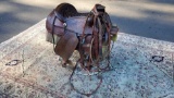 VINTAGE LEATHER SADDLE AND WHIP WITH STAND