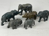 PLASTIC AND METAL ELEPHANTS AND A RHINO