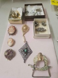 9 SETS OF BROOCHES AND PINS