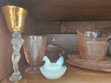 GLASSWARE ON TOP SHELF OF HUTCH
