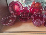 GLASSWARE ON THIRD SHELF OF HUTCH