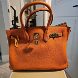 ORANGE DESIGNER BAG MARKED HERMES