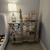 3 DRAWER BEVELED GLASS & MIRROR DRESSER WITH DECORATIONS
