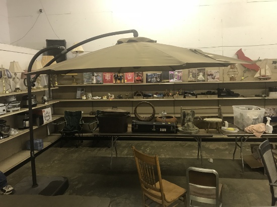 Tan outdoor umbrella on curved stand/base (lot 11)