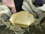 Kitchen Table with 3 chairs on wheels & a leaf (lot 10)