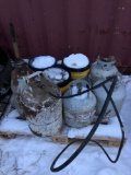 Propane tanks, oil buckets, can
