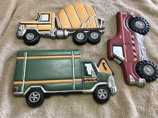 Wall hanging trucks, approx 8 inches long each