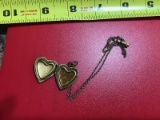 Necklace with charm, appears to be gold filled