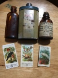 2 Bottles, one is a handwritten medicine bottle, metal tin, and 3 Tobacco Cards
