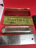 Marimba Harmonica, with damaged box.