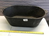22 inch long cast iron footed pot, was most recently used as a planter