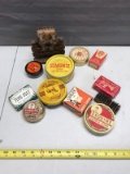 Group of cleaning product tins, most are shoe related