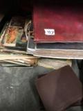 15-20 more vintage scrapbooks, many have calendar art in them.  They were all stored in a basement.
