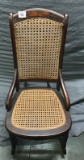 Cane Rocking Chair, wood frame, small imperfection in the caning on the seat