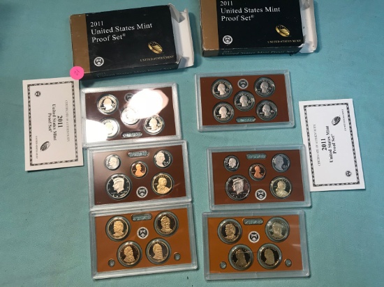 2- 2011 Proof Sets. One case is cracked, see pics