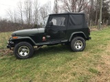 '99 Green Jeep Sahara
