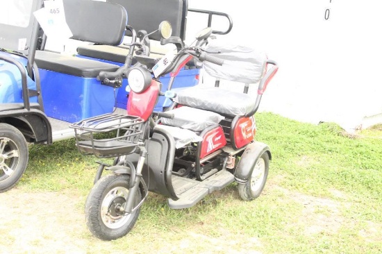 UNUSED 3 WHEEL ELECTRIC SCOOTER- DOES NOT COME WITH THE BATTERY.
