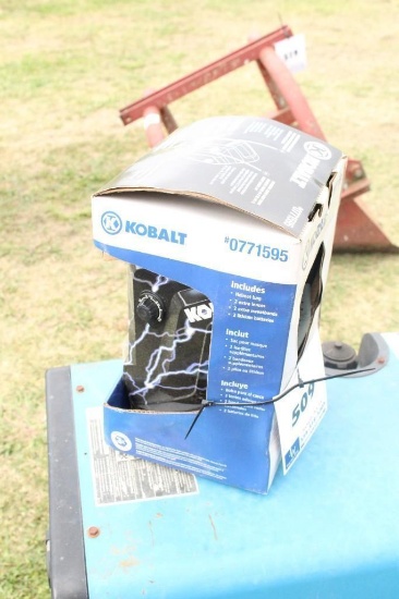 UNUSED KOBALT WELDING HELMET, INCLUDES HELMET BAG, 2 EXTRA LENS, 2 EXTRA BATTERIES