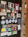 Scrapbooking Embellishments in 2 Small Bins and 8.5x11 Paper