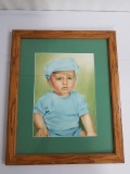 Framed Image of Toddler in Blue Clothing