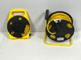 Two extension cord reals with extra outlets