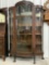 QUARTER SAWN OAK TRIPLE CURVED GLASS CHINA CABINET CLAW FOOTED BEVELED AND LEADED GLASS DOOR