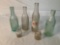 6 GLASS BOTTLES ALL WITH ADVERTISING