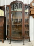 QUARTER SAWN OAK TRIPLE CURVED GLASS CHINA CABINET CLAW FOOTED BEVELED AND LEADED GLASS DOOR