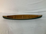 WOODEN CHILD'S CANOE WITH PADDLE 27