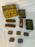 FLAT FULL OF TOBACCO TINS, AUTO FUSE TINS, COUGH SYRUP AND PETROLEUM JELLY TUBES