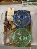 Two ashtrays and one green and one blue candy dish