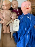 Four unmarked antique dolls