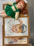 Doll and framed prints