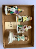 FOUR COLLECTIBLE FIGURINES
