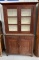 PRIMITIVE STEP BACK ONE PIECE CUPBOARD