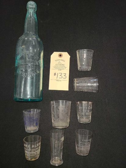 AQUA MILLER BOTTLE AND 8 ADVERTISING SHOT GLASSES