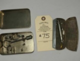 ANTIQUE TINS WITH MEDICAL INSTRUMENTS