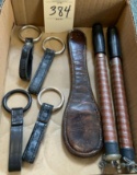 4 LEATHER STRAPS WITH RINGS, PADDLE, PAIR OF NUNCHUCKS