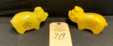 2 PLASTIC YELLOW ADV PIG BANKS