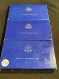 3 - 1986 UNITED STATES LIBERTY COIN SETS SILVER DOLLAR AND HALF DOLLAR PROOFS