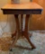 Antique wooden table on casters