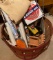 Apple basket with misc household items