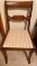Antique wooden side chair with upholstered seat