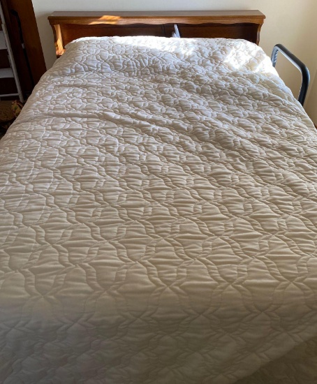 Double bed with headboard and side rail