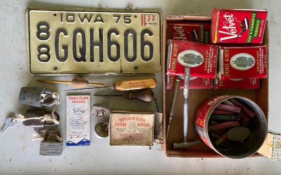 License plate, fish hooks, ice picks Creston Iowa, parallax, gun shells, and tobacco tins