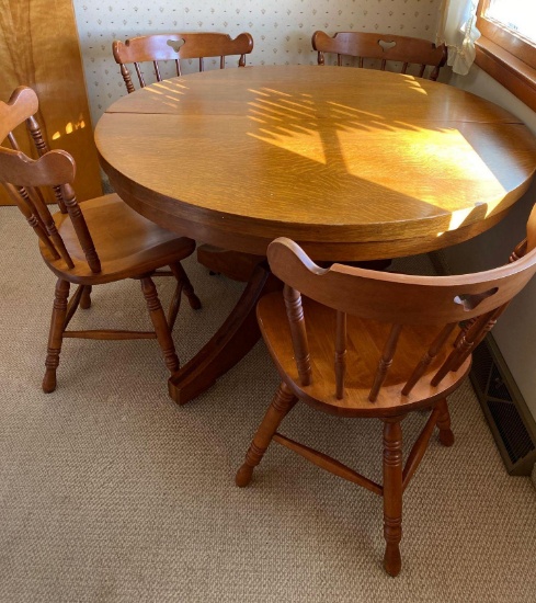 Wooden kitchen table with 4 swivel chairs