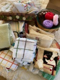Wicker baskets, kitchen towels and wash cloths