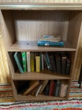 Bookcase including books