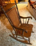Wooden rocker with cane back